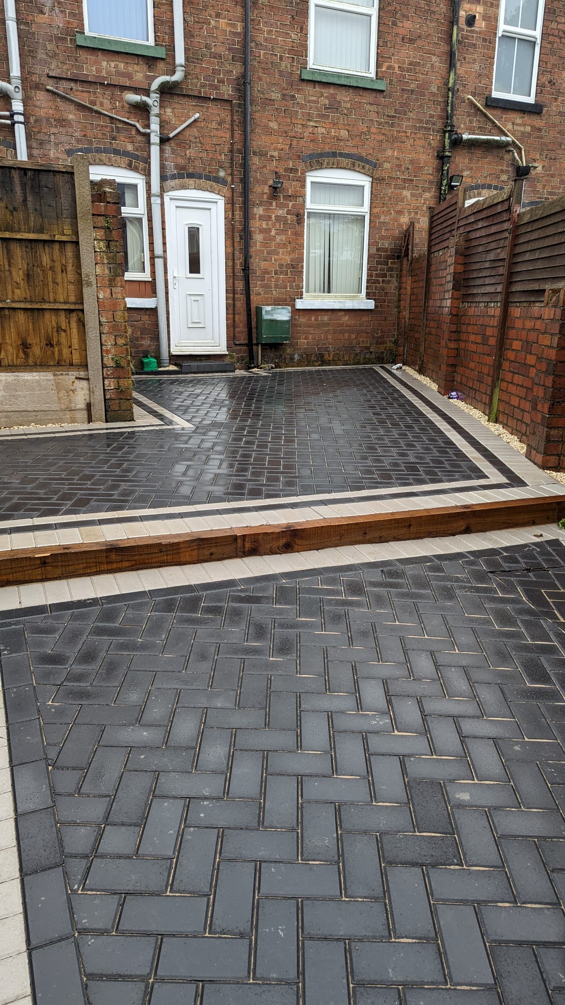 Charcoal herringbone block paving driveway