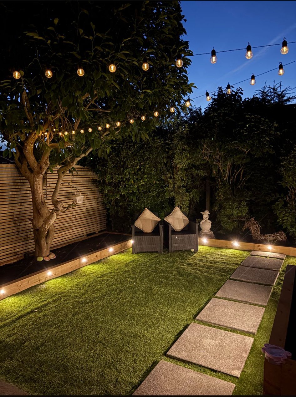Garden with integrated lighting at dusk