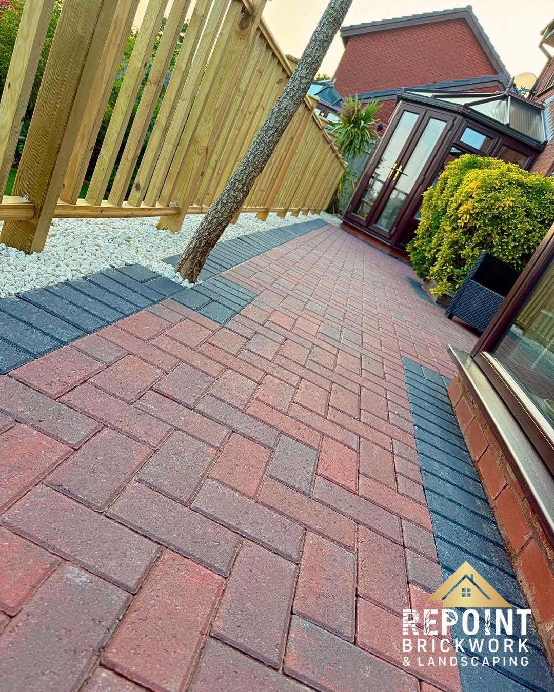 Herringbone block paving path, red and charcoal